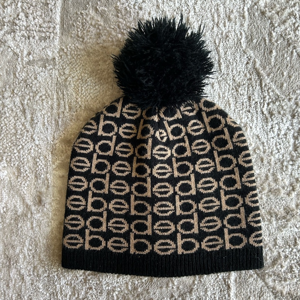 Black and brown Bebe pom pom beanie